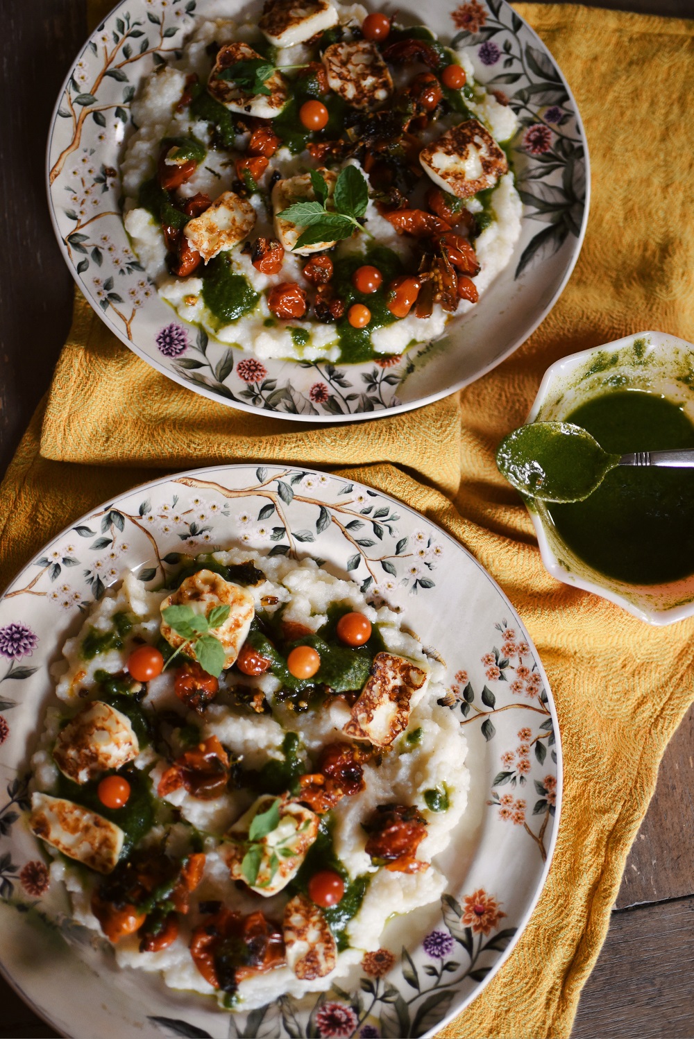 Blistered Tomato Polenta with Mint Pistachio Pesto Recipe: this rustic vegetarian recipe is the perfect way to use fresh mint in a savory dinner dish! #mintpesto #mintrecipe #blisteredtomatopolenta #vegetarianrecipe