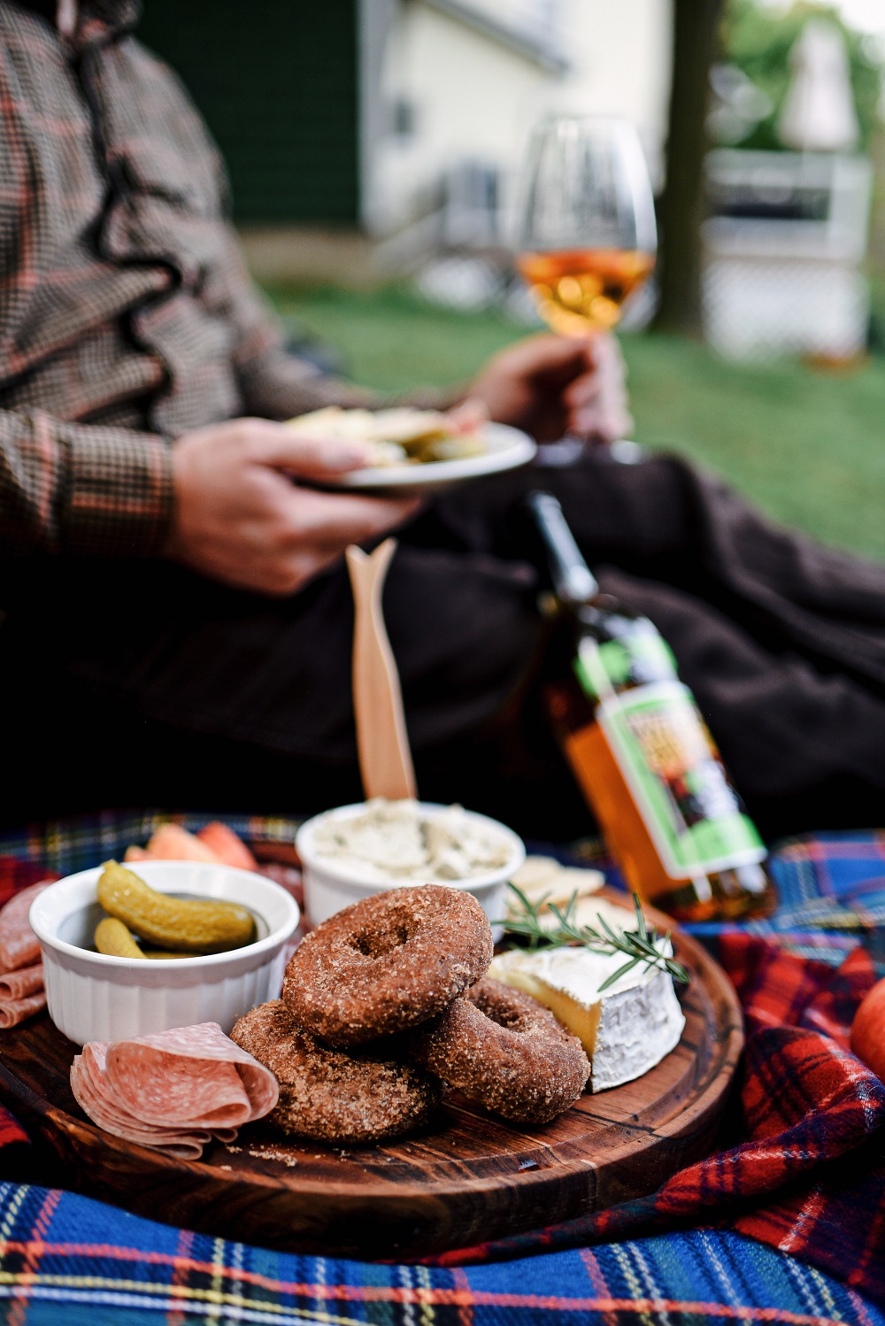 Everyday Magic: Fall Picnic. Fall picnic photoshoot inspiration, with tips for creating a fall cheeseboard to serve with Witches Brew Spiced Apple wine. #witchesbrew #applewine #fallpicnic #fallpicnicphotoshoot #fallcheeseboard #michiganwinery #michiganwine #leelanauwine #michiganblog #michiganinfluencer