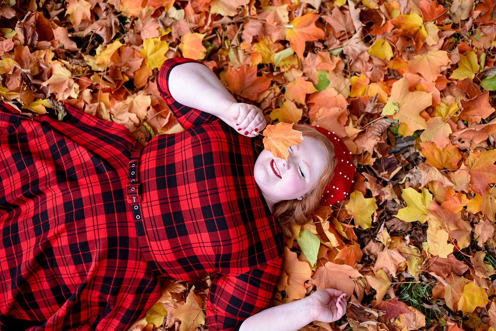 The Perfect Red Plaid Dress: the plus size Devon Swing Dress from Unique Vintage styled for holiday and Christmas with a red pearl beret and black T-straps. #uniquevintange #plaiddress #redplaiddress #redberet #pearlberet #fallleavesphotoshoot #fallleaves #autumnleaves