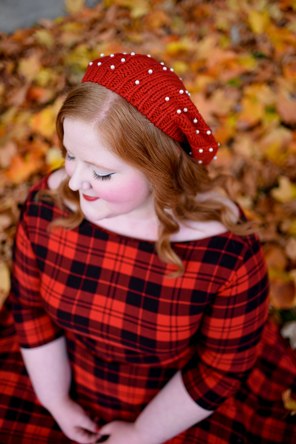 The Perfect Red Plaid Dress: the plus size Devon Swing Dress from Unique Vintage styled for holiday and Christmas with a red pearl beret and black T-straps. #uniquevintange #plaiddress #redplaiddress #redberet #pearlberet #fallleavesphotoshoot #fallleaves #autumnleaves
