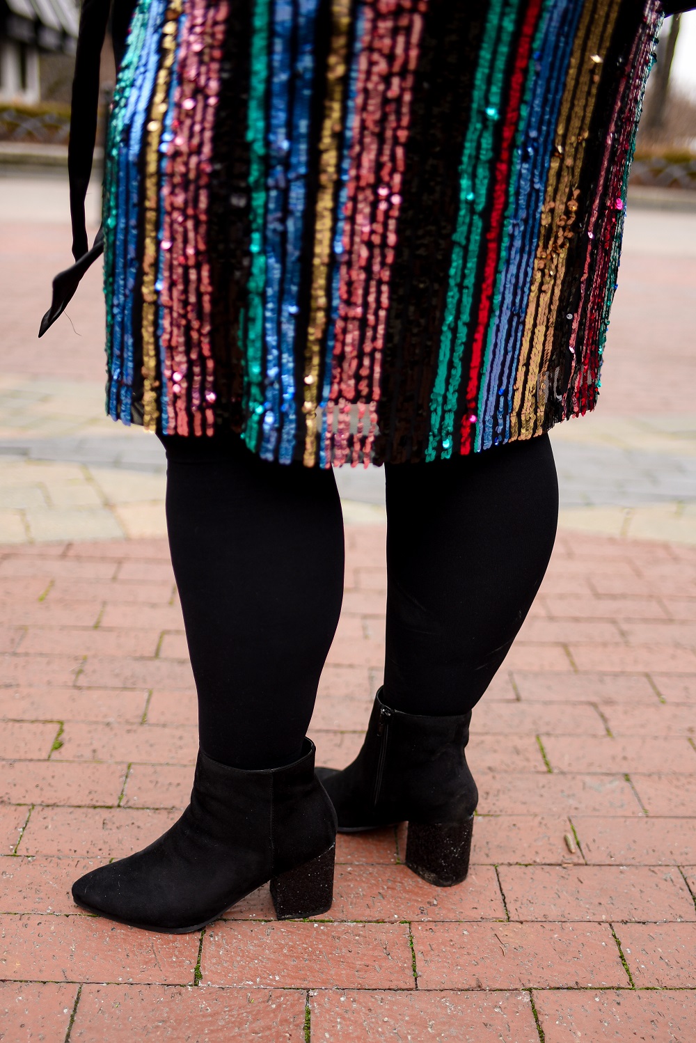 How to Layer Your Party Dress: a plus size holiday outfit featuring a colorful sequin dress from Lane Bryant styled with a long sleeved tee and tights. #lanebryant #createyourlane #shareyourbright #plussizeholidayoutfit #plussizepartydress