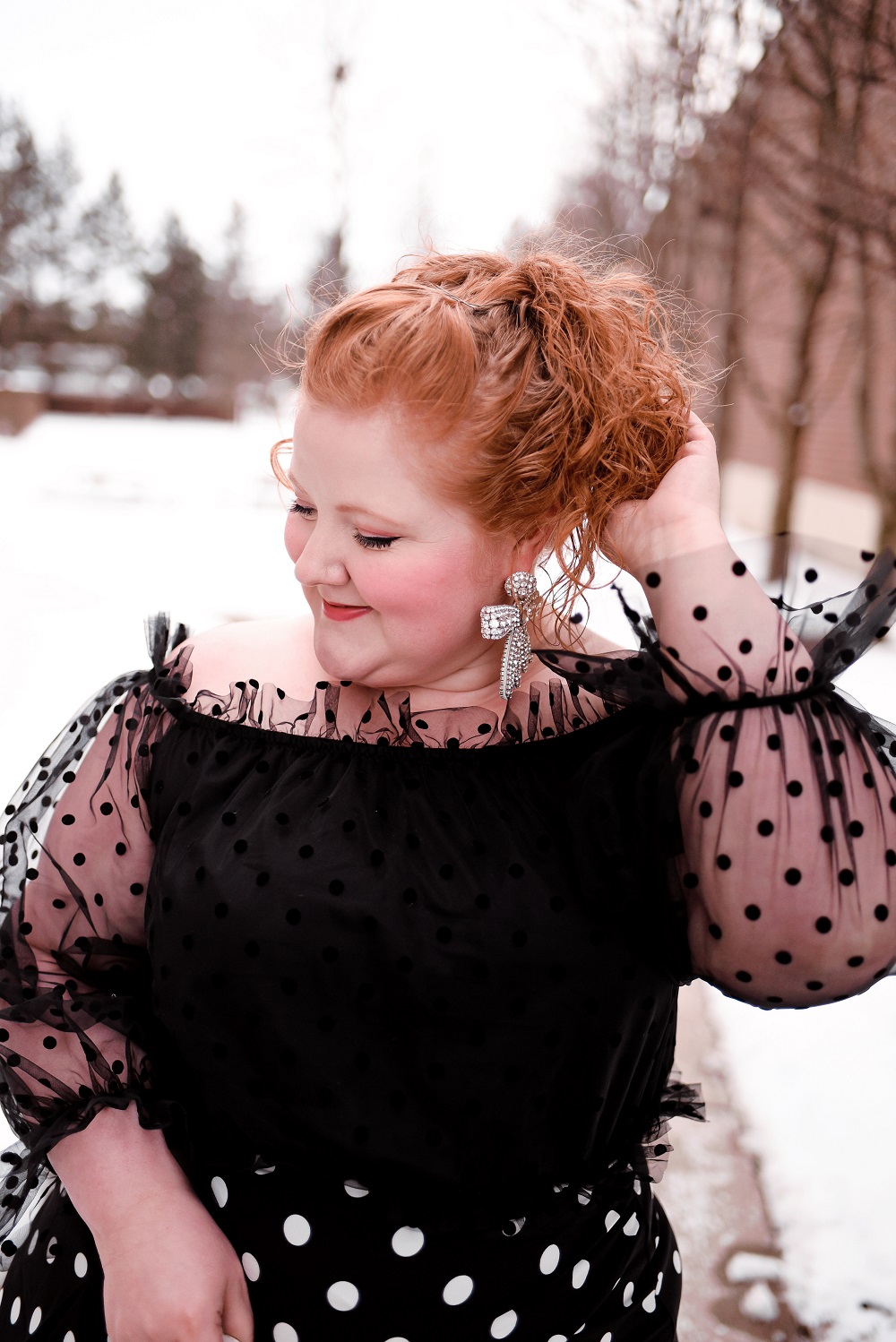 Polka Dots, Ruffles, and Tulle: A cute plus size polka dot outfit from ELOQUII, with French and Ford bow earrings and a Gucci Jackie 1961 bag. #eloquii #xoq #frenchandford #bowearrings #guccijackie #guccijackiebag #guccijackie1961 #plussizeoutfit #plussizefashion #plussizestyle