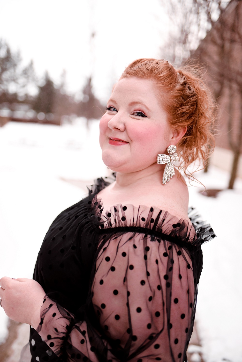 Polka Dots, Ruffles, and Tulle: A cute plus size polka dot outfit from ELOQUII, with French and Ford bow earrings and a Gucci Jackie 1961 bag. #eloquii #xoq #frenchandford #bowearrings #guccijackie #guccijackiebag #guccijackie1961 #plussizeoutfit #plussizefashion #plussizestyle