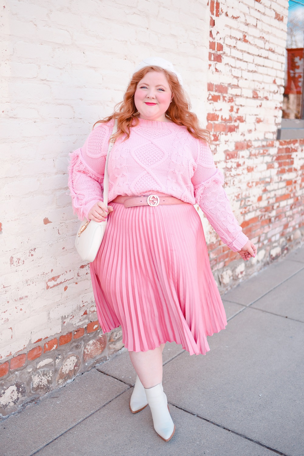 A Pretty in Pink Outfit for the Spring Transition: Mint Julep Boutique sweater, H&M skirt, Gucci Jackie 1961 bag, and Marc Fisher boots. #shopthemint #mintjulepboutique #guccijackie1961 #plussizefashion #plussizestyle