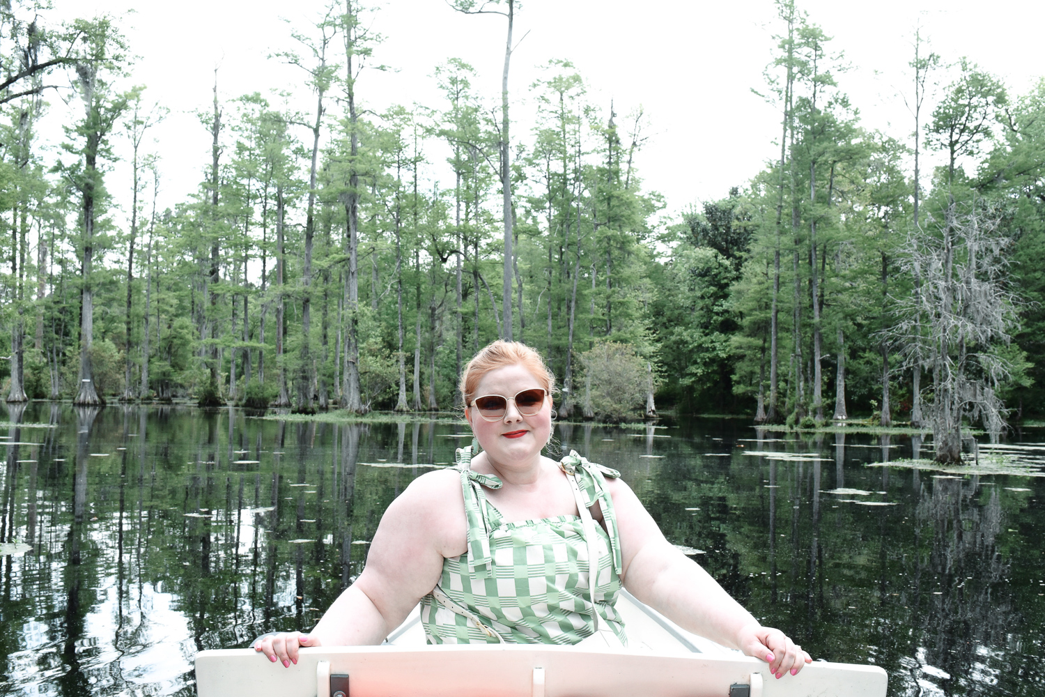 Cypress Gardens South Carolina: Planning a trip to Charleston? Take a morning drive out to Cypress Gardens for a romantic paddle boat tour. #cypressgardens #cypressgardenssc #cypressgardenssouthcarolina #visitcharleston #charlestondaytrip #plussizetravel