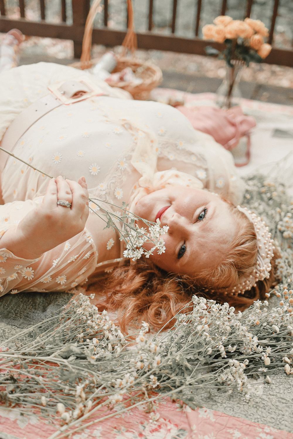 A Cottagecore Picnic for International Picnic Day: shop picnic baskets, fresh flowers and floral quilts for a cottagecore photshoot! #cottagecore #cottagecorepicnic #cottagecorephotoshoot #picnicphotoshoot #folkloreinspiredphotoshoot