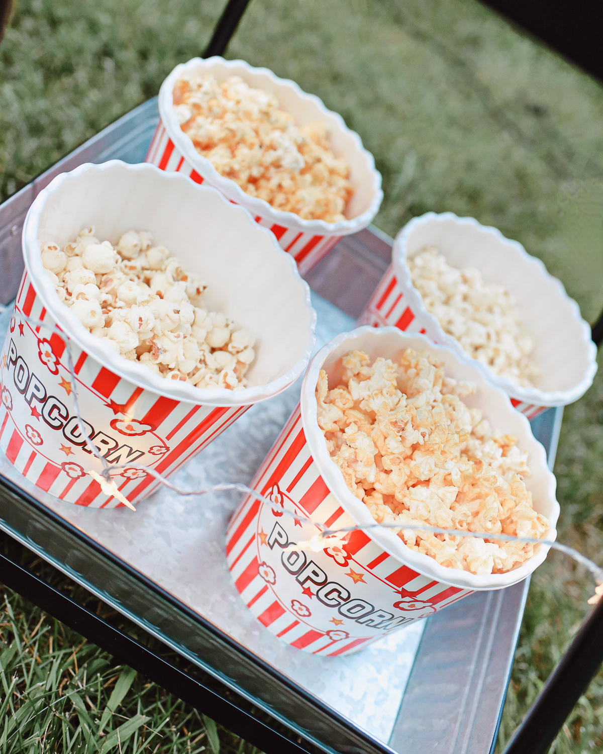 Backyard Movie Night | Make the most of these long summer nights with a projector and inflatable outdoor movie screen right in your own backyard! #samsclub #outdoormovienight #backyardmovienight #backyardmovies #samsclubsummer