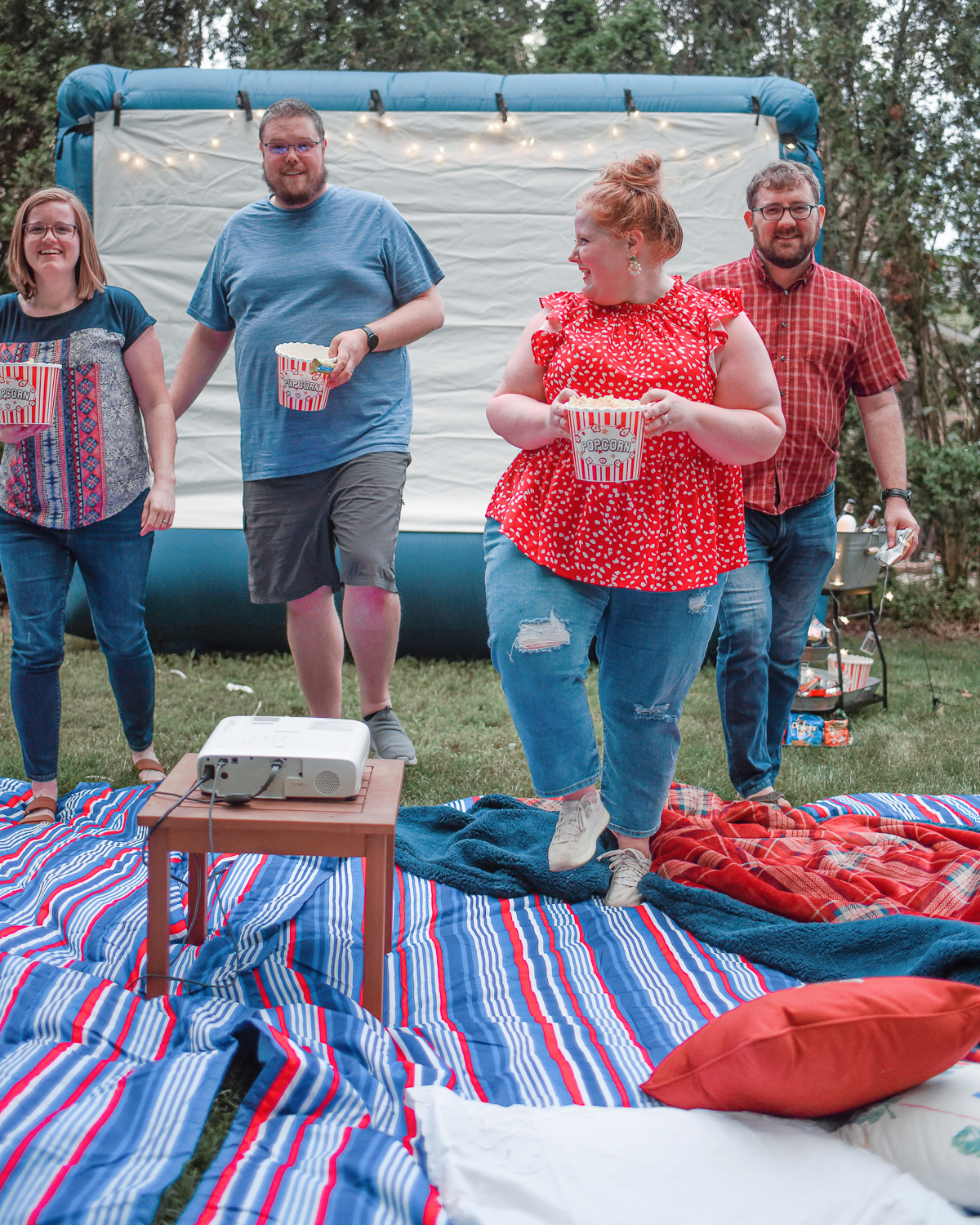 Backyard Movie Night | Make the most of these long summer nights with a projector and inflatable outdoor movie screen right in your own backyard! #samsclub #outdoormovienight #backyardmovienight #backyardmovies #samsclubsummer