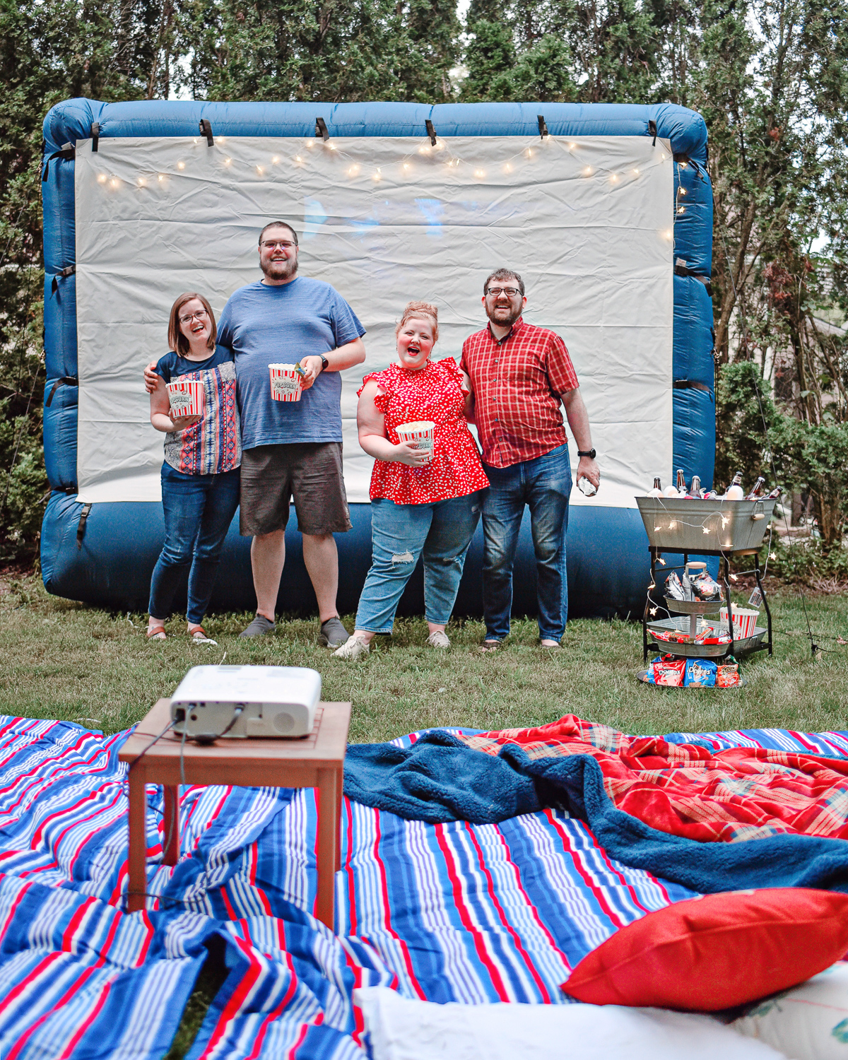 Backyard Movie Night | Make the most of these long summer nights with a projector and inflatable outdoor movie screen right in your own backyard! #samsclub #outdoormovienight #backyardmovienight #backyardmovies #samsclubsummer