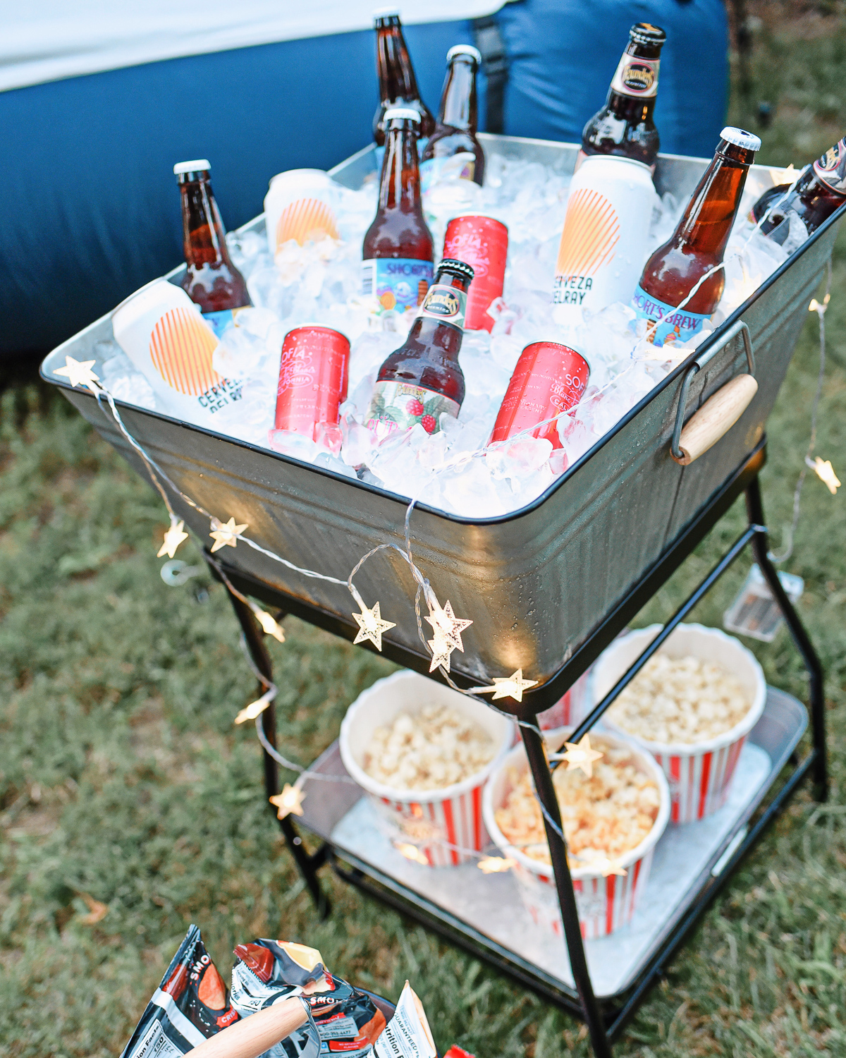 Backyard Movie Night | Make the most of these long summer nights with a projector and inflatable outdoor movie screen right in your own backyard! #samsclub #outdoormovienight #backyardmovienight #backyardmovies #samsclubsummer