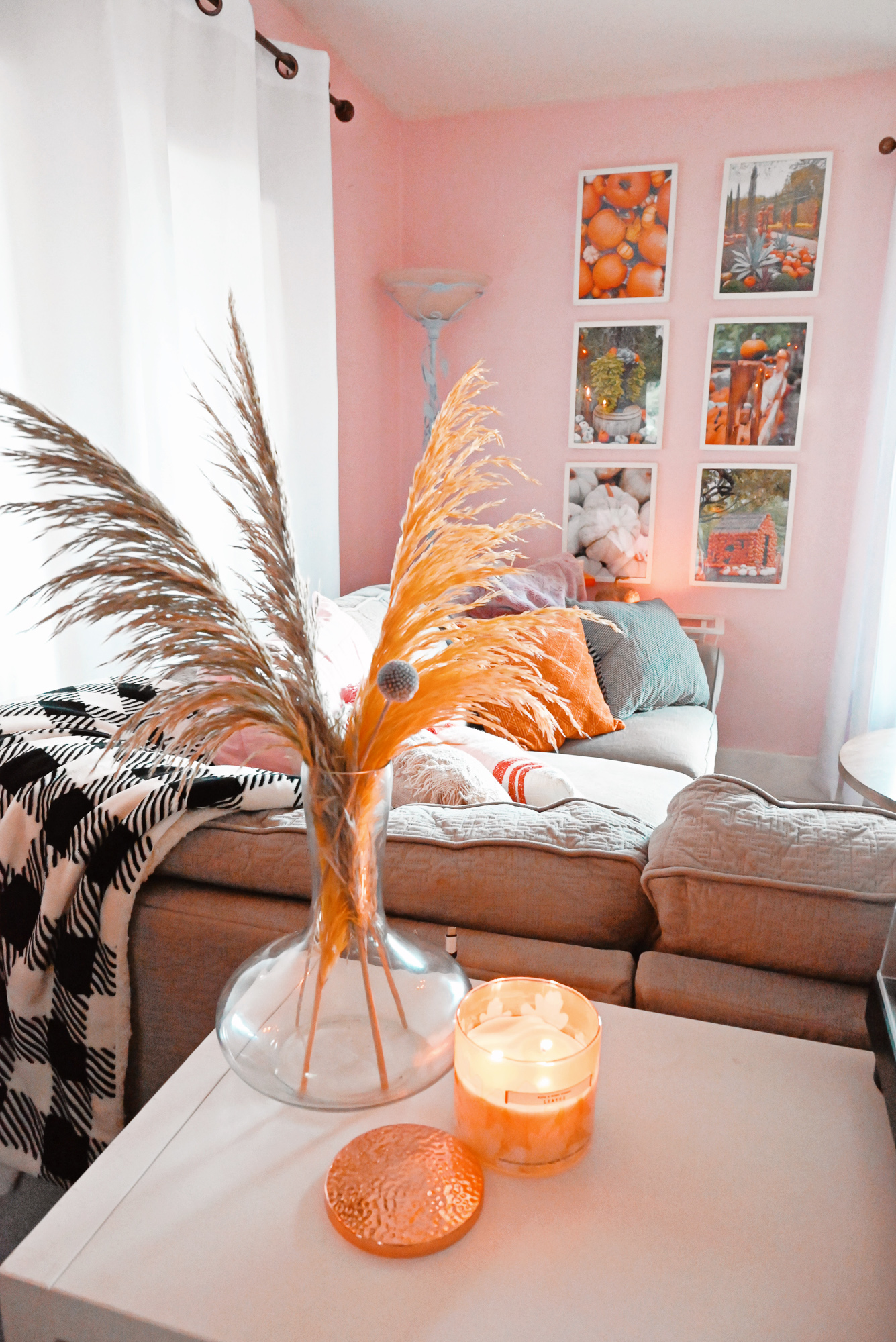My Fall 2021 Home Tour: see how I've decorated my living room for fall and Halloween with finds from Target, Amazon, and Pottery Barn. #fallhometour #fallhomedecor #falldecor #falldecorating #halloweendecor