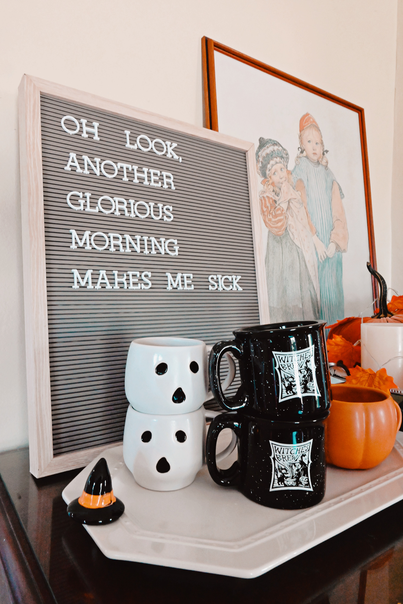 My Fall 2021 Home Tour: see how I've decorated my living room for fall and Halloween with finds from Target, Amazon, and Pottery Barn. #fallhometour #fallhomedecor #falldecor #falldecorating #halloweendecor