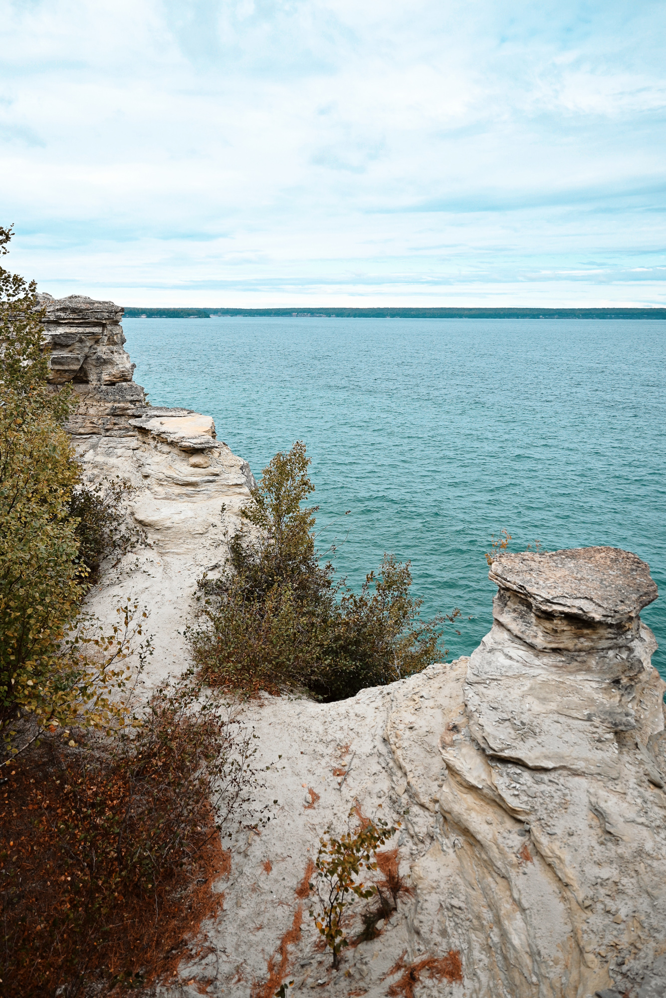 U.P. Weekend in Munising Michigan: a travel blog from our fall trip to Au Train to see the Pictured Rocks, shipwreck tours and Munising Falls. #munising #autrain #picturedrocks #picturedrocksnationallakeshore #upperpeninsula #upmichigan #michiganup #michigantravel #michiganvacation #upnorth