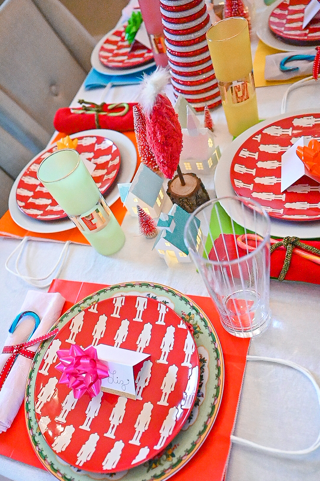 A Merry Grinchmas Tablescape: a colorful tablescape for a Whoville holiday dinner party inspired by How the Grinch Stole Christmas.