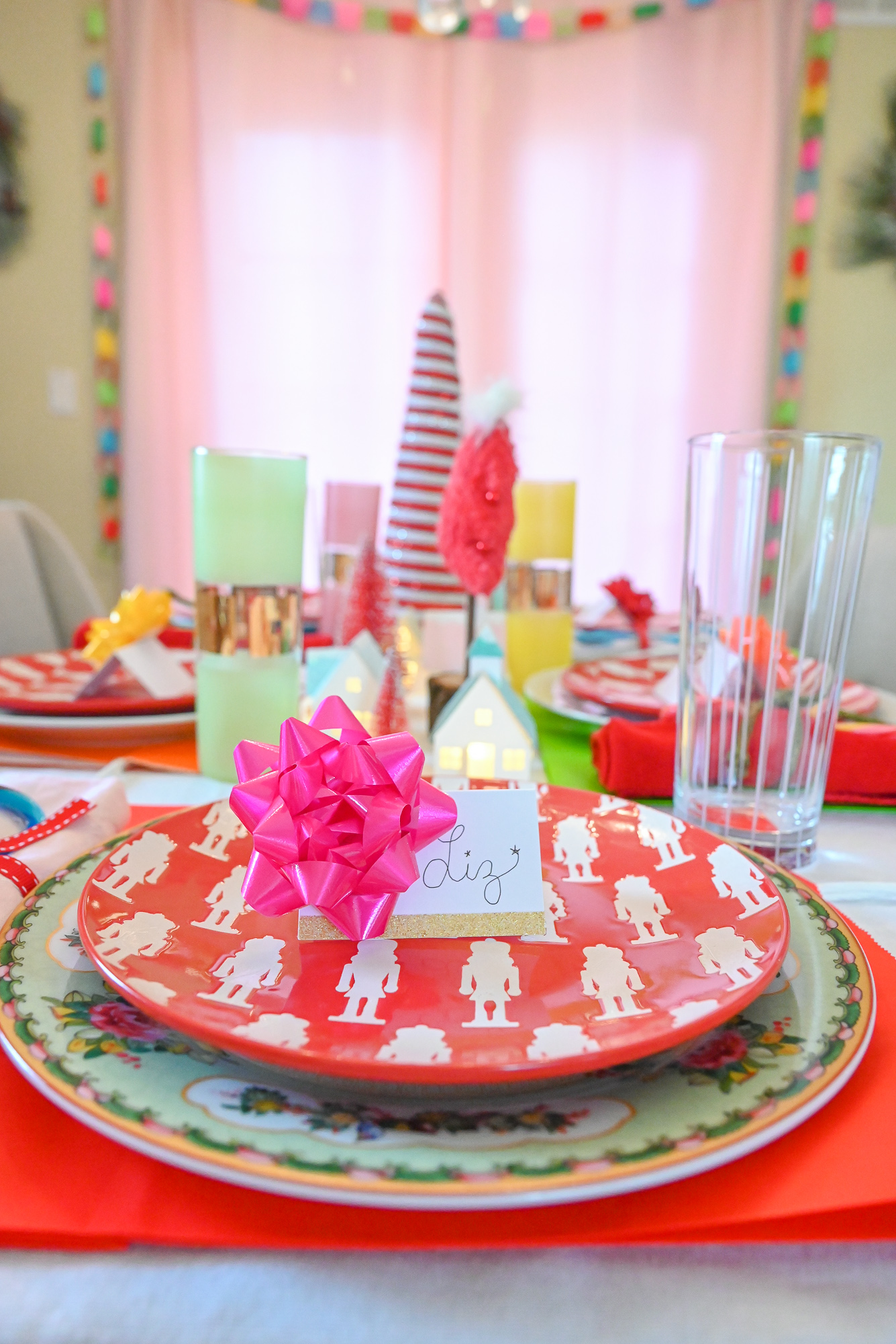 A Merry Grinchmas Tablescape: a colorful tablescape for a Whoville holiday dinner party inspired by How the Grinch Stole Christmas. 