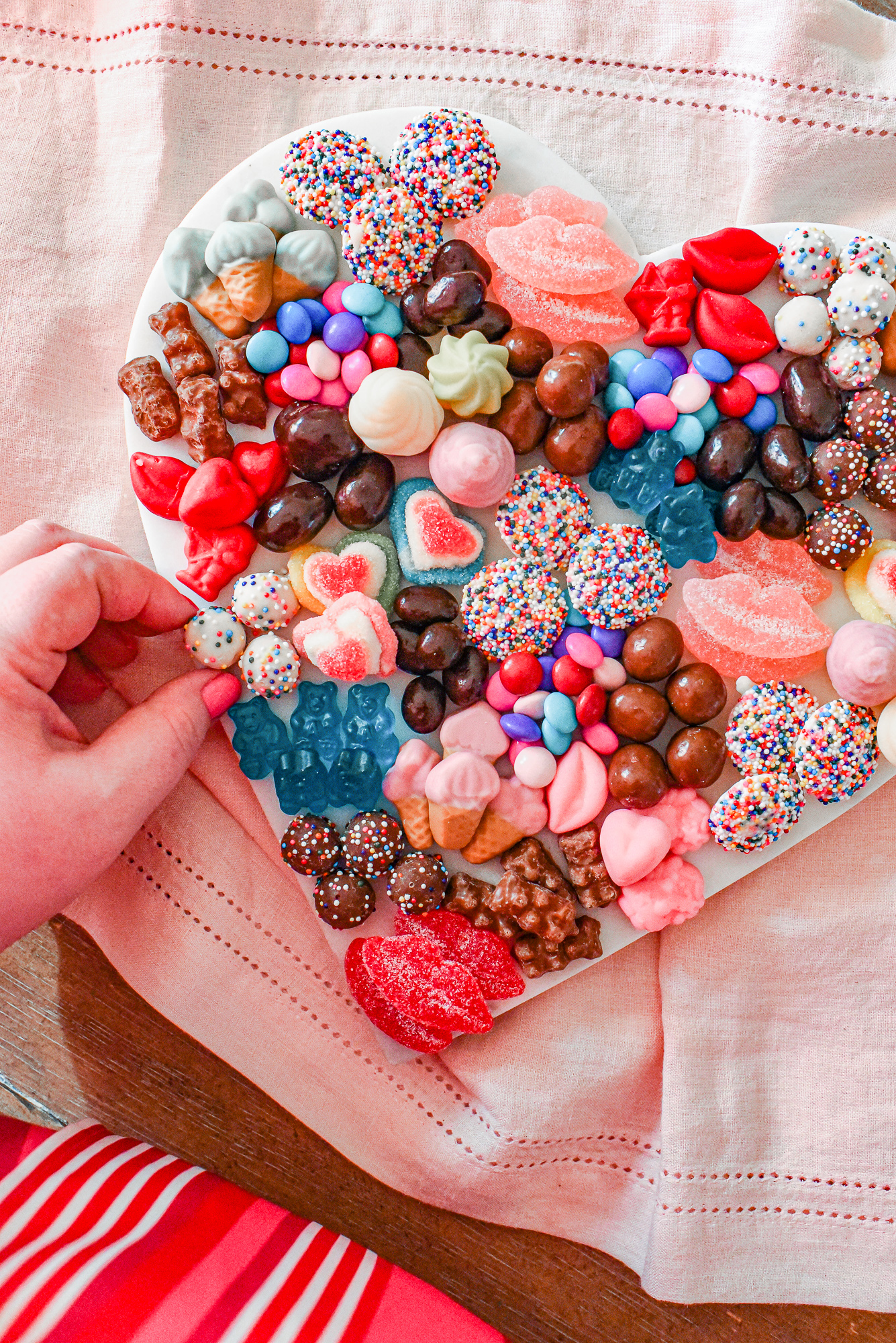 Valentine's Day Heart Shaped Candy Board: recreate this Valentine candy board with a heart shaped platter and Dylan's Candy Bar candies.
