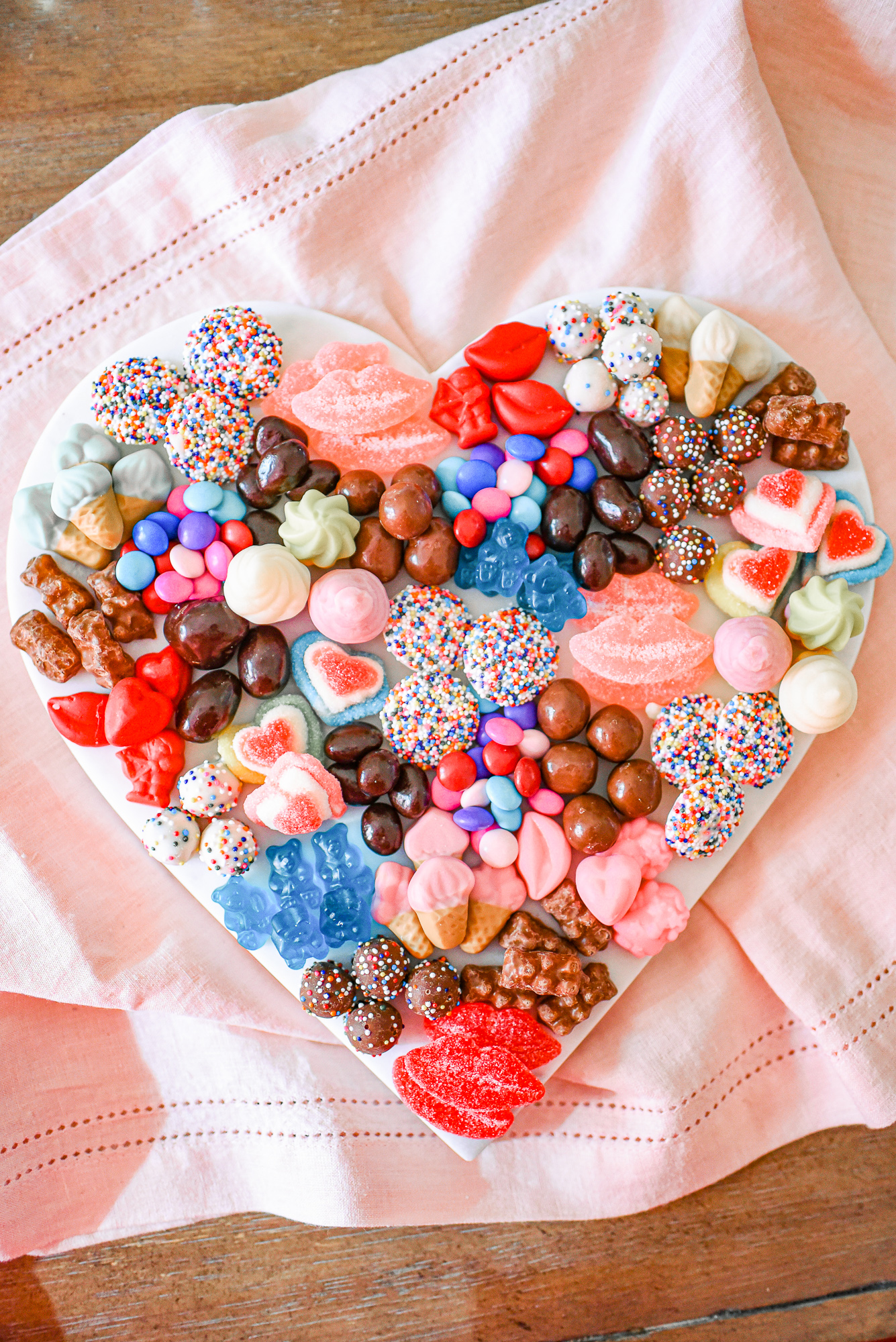 Valentine's Day Heart Shaped Candy Board: recreate this Valentine candy board with a heart shaped platter and Dylan's Candy Bar candies.