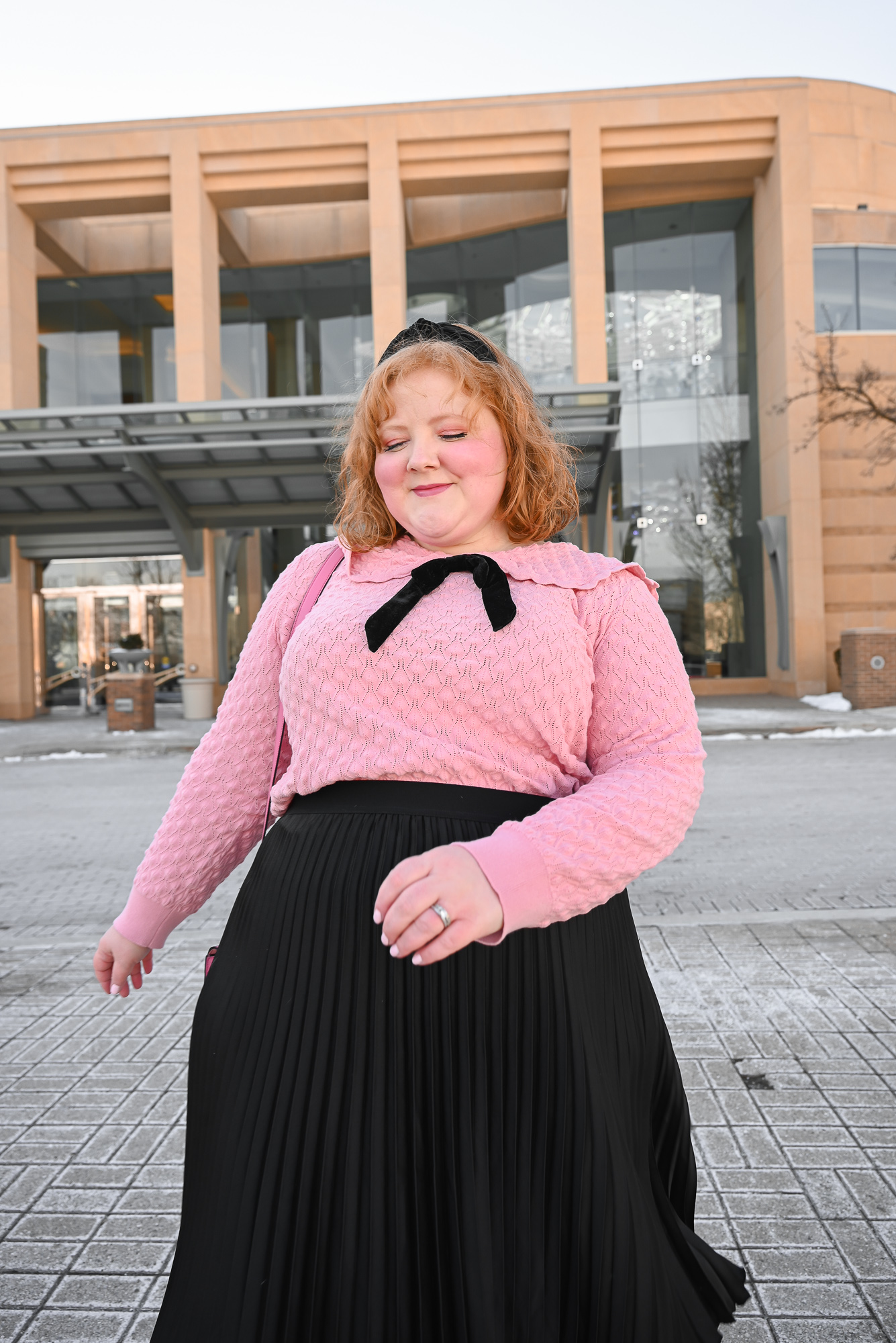 A French Girl Winter Outfit: a plus size fashion blogger shares her tips for channeling the feminine and chic French girl style aesthetic.