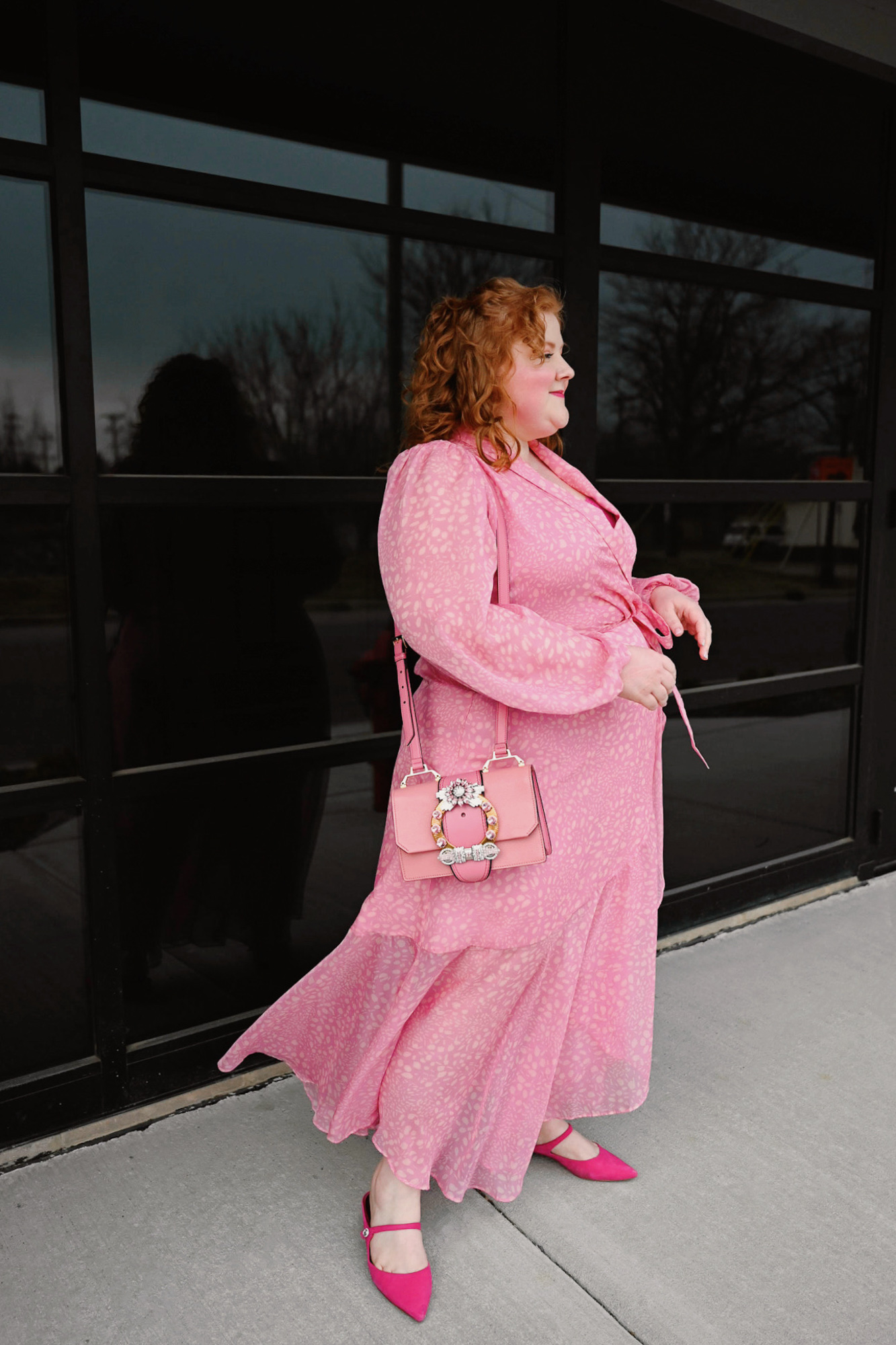 Pink Spring Dresses | a roundup of trendy pink dresses for you to shop in sizes 00-28W, along with a review of this ELOQUII wrap dress.