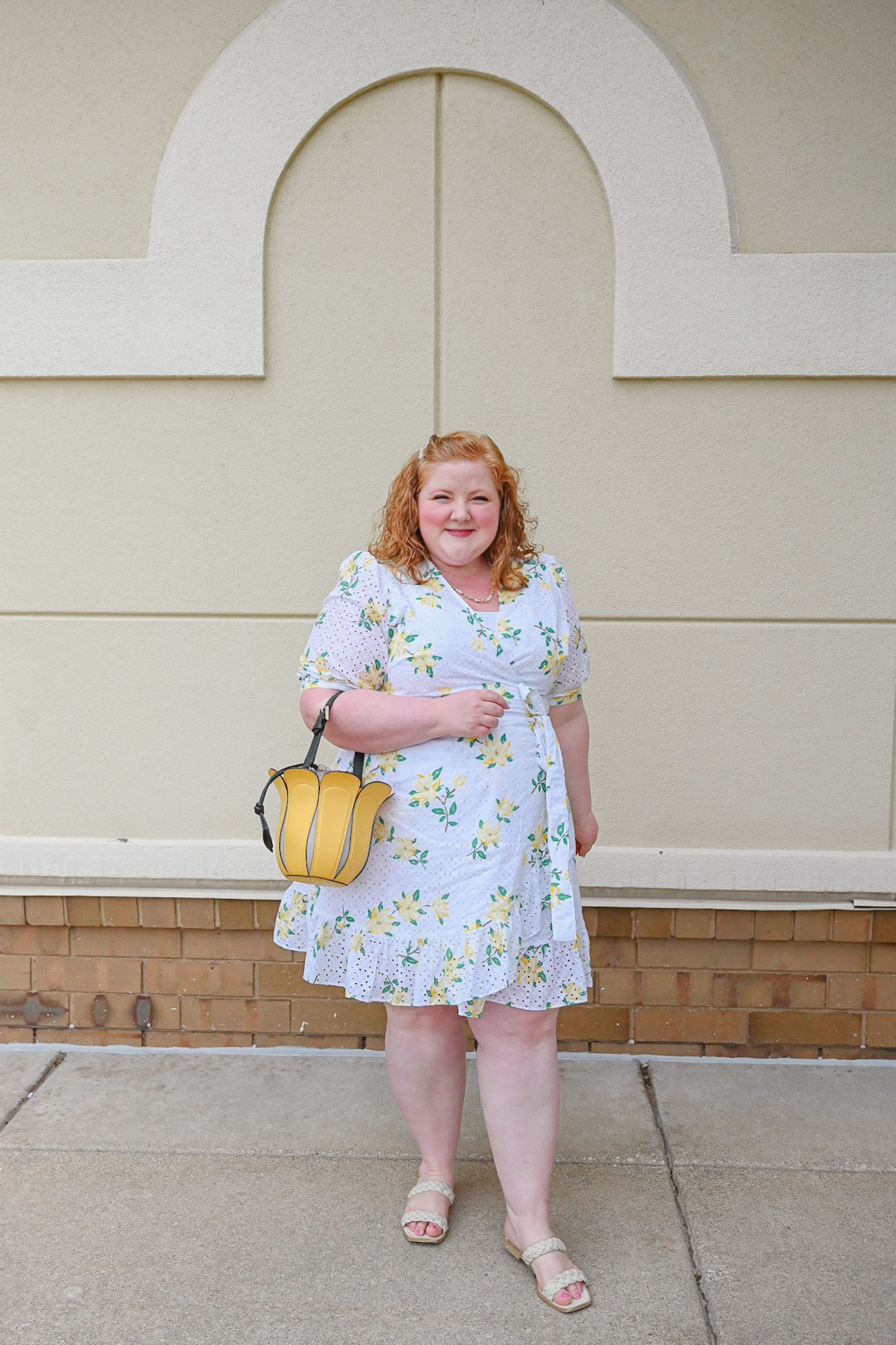 Preppy Summer Style with Draper James | Style the DJ Reba Wrap Dress in Magnolia Eyelet with pearl jewelry, a yellow bag, and flat white sandals.
