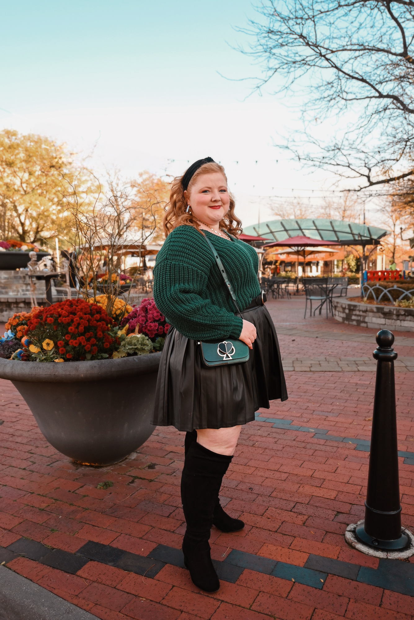 An Evergreen and Black Holiday Outfit | Shop Twelve Oaks Mall in Novi, MI for winter trends like evergreen, chunky knits, and faux leather.