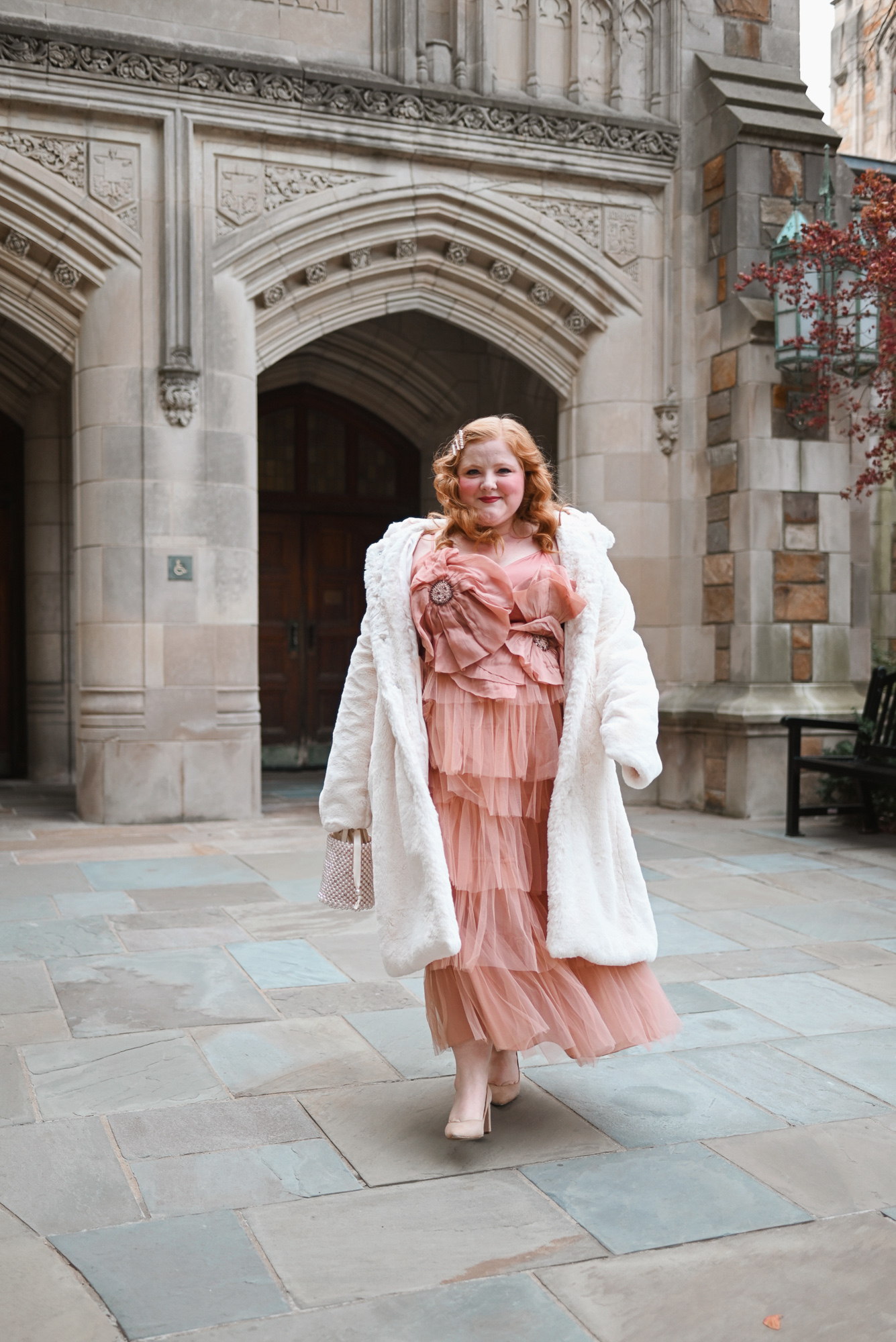 A Plus Size Outfit for the Nutcracker Ballet | Style a breathtaking gown with a dress coat and glam accessories for a magical night out.
